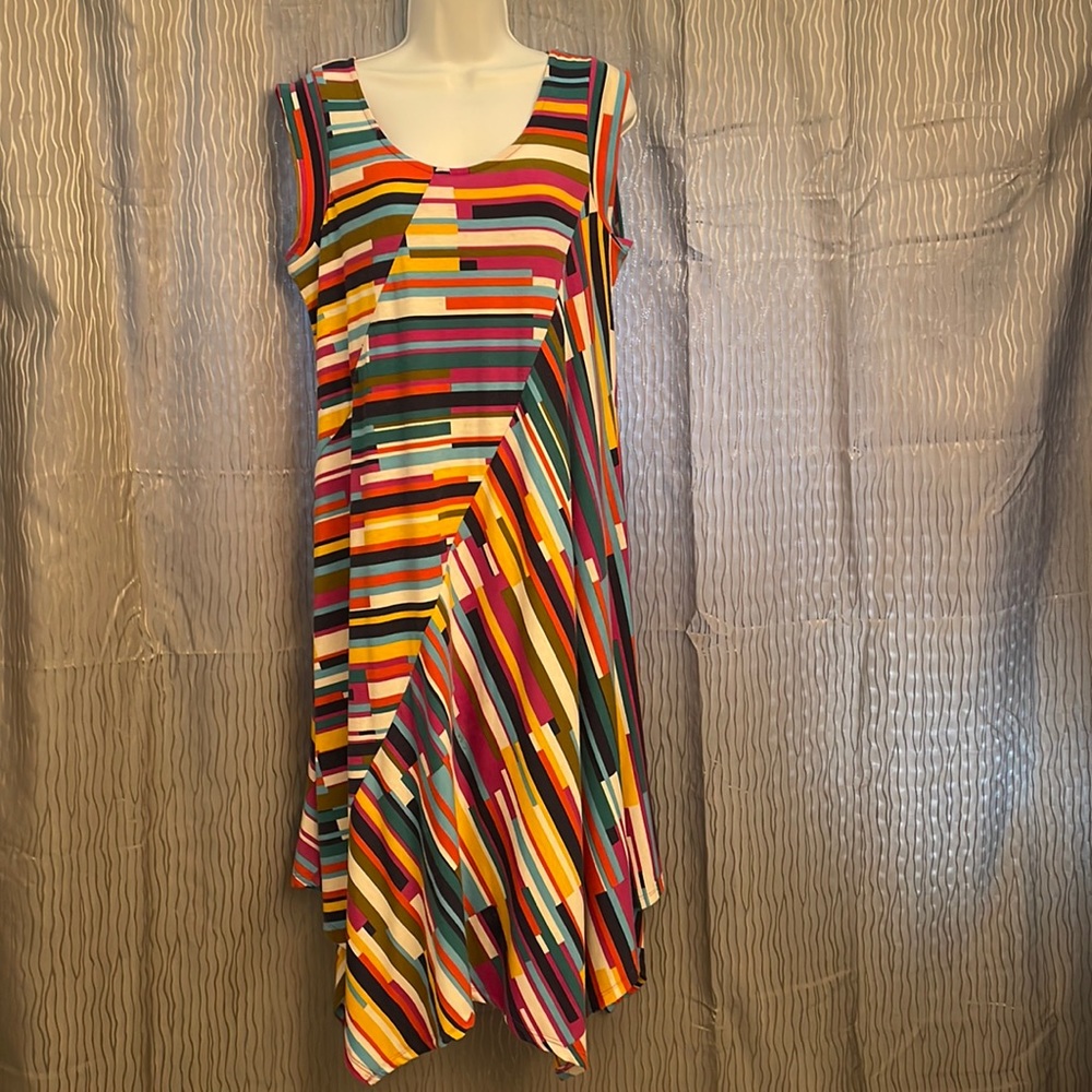 Multi colored dress with bias cut and handkerchief hemline